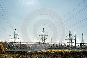 High voltage pole, High voltage power electric transformer substation, modern technology abstract background