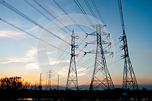High voltage pole on sky sunset background