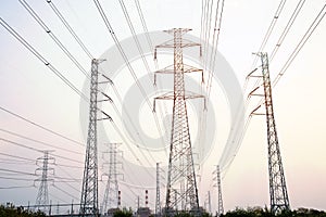 High voltage pole on sky sunset background