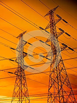 High Voltage Pole on Sunset Background Power Line Tower electric Transmission Energy Station,Plant Substation Pylon Industry