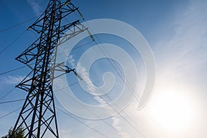 High-voltage pole wires power lines at sunset electricity distribution station.high voltage electric transmission tower