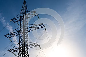 High-voltage pole wires power lines at sunset electricity distribution station.high voltage electric transmission tower