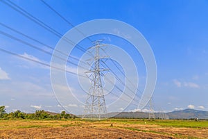 High voltage post with blue sky