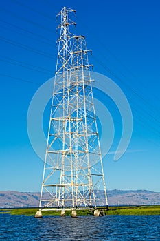 High voltage post,High voltage tower at blue nice sky and sea - Palo Alto, California , USA