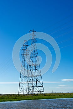 High voltage post,High voltage tower at blue nice sky and sea - Palo Alto, California , USA