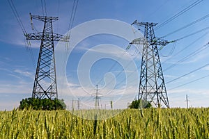 High voltage post. High-voltage tower on blue sky