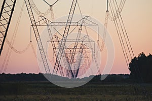 High voltage post,High voltage tower sky sunset background.