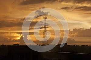 High voltage post. High-voltage tower sunset background.
