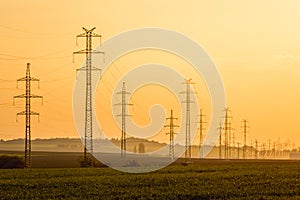 High voltage post tower sky sunset background