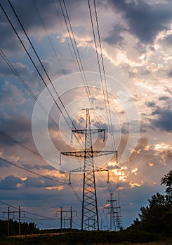 High voltage post. High-voltage tower sunset background