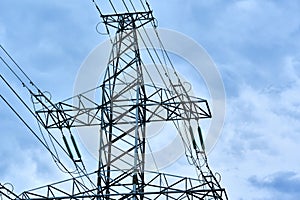 High-voltage power line against the blue sky. general plan. color