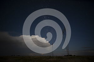 High voltage power line in a nocturnal landscape, La Pampa