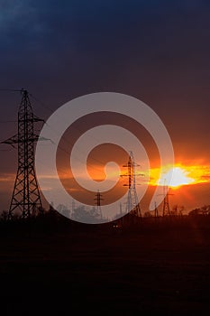 High voltage power line at sunset