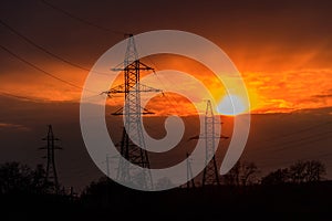 High voltage power line at sunset
