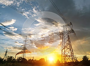 High-voltage power lines on the background of a beautiful cloudy sky