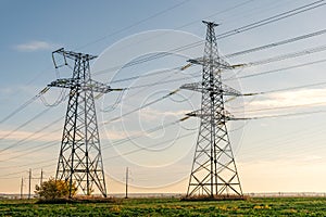 High-voltage power lines. Electricity distribution station. high voltage electric transmission tower. Distribution electric