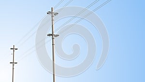 High voltage power lines electricity poles