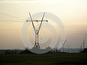 High voltage power lines at sunset