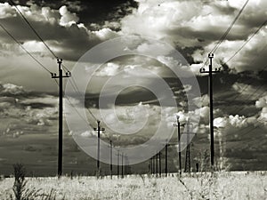 High-voltage power lines in the steppe. Infrared.