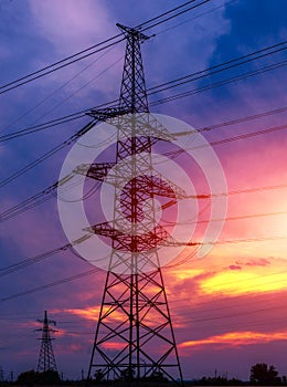 High-voltage  power lines at sunset