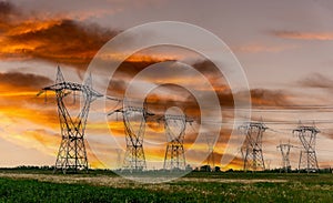 High voltage power lines at sunset