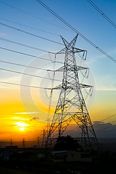 High-voltage power lines at sunset,high voltage electric transmission tower