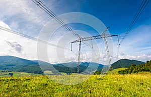 High voltage power lines tower in Carpathian mount