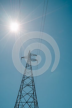 High Voltage Power Pole Line Clear Blue Sky