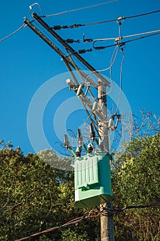 High-voltage power pole with transformer