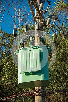 High-voltage power pole with transformer
