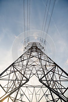 High-Voltage Power Tower from Ground Perspective