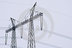 High-voltage power transmission towers.