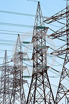 High-voltage power transmission towers.