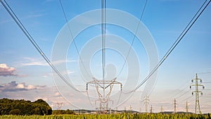 High voltage pylon on skies background, Transmission line tower.