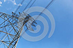 High voltage tower or Electric transmission line with blue sky and white cloud
