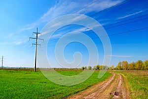 High voltage tower in field