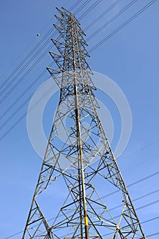 high voltage tower pole and transmission electrical power lines with aircraft warning ball