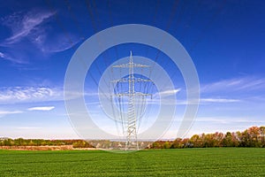 High-voltage tower sky background . photo