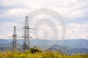 High voltage towers Electric pole. Power line support with wires for electricity transmission. High voltage grid tower