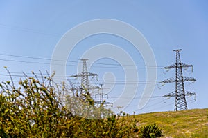 High voltage towers Electric pole. Power line support with wires for electricity transmission. High voltage grid tower