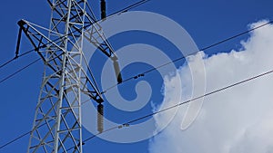 High voltage towers on skies background. Transmission line tower.