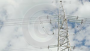 High voltage towers with sky background.