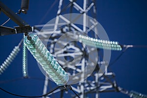 High voltage transmission power tower with glass insulators