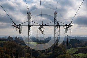 High voltage transmission tower, power line modernization, high-rise work on the power transmission line