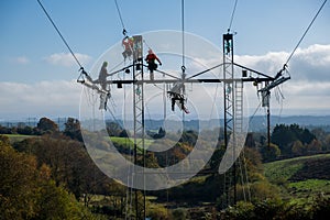 High voltage transmission tower, power line modernization, high-rise work on the power transmission line