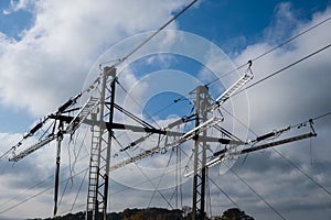 High voltage transmission tower, power line modernization, high-rise work on the power transmission line