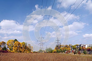 High voltage transmission towers - autumn landscape