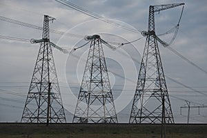 High-voltage wires against the backdrop of cold weather in Ukraine. Energy and electricity. The threat of de-energized cities.
