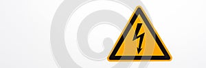 High voltage yellow triangle warning sign