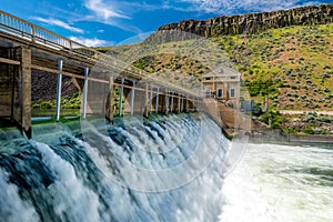 Close up of water flowing over the one diversion dam on the Boise River in Idaho photo